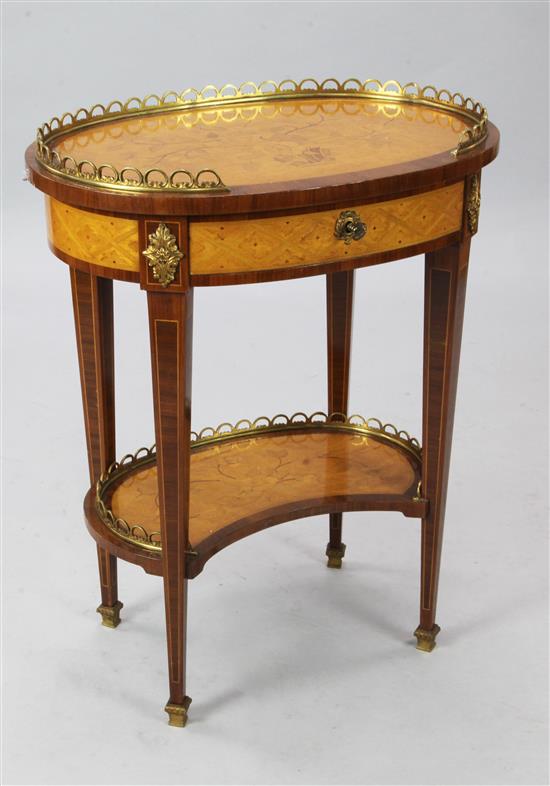 A French cross banded maple and marquetry oval occasional table, W. 2ft. D. 1ft 5in. H. 2ft 6in.